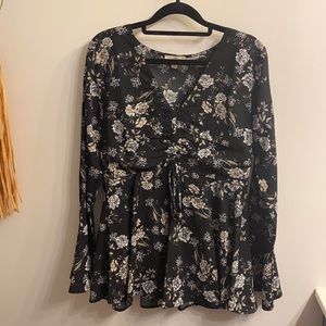 Entro Bell-sleeve floral top.